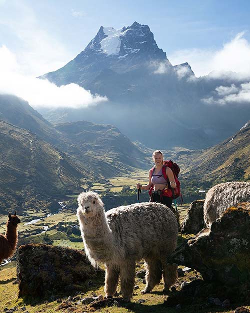 Woman together an alpaca in the Lares Trek Cusco Peru
